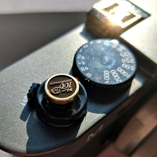 silver brass shutter button for nikon camera