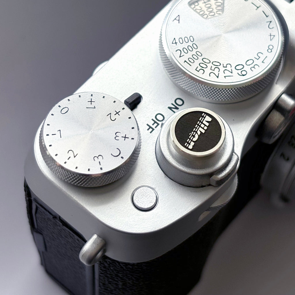 Nikon camera shutter release with engraved design