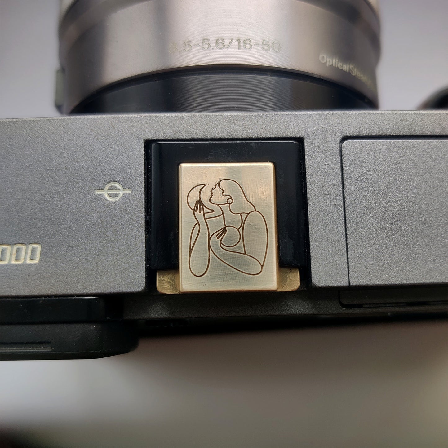 artistic engraved camera hot shoe cover collaboration piece