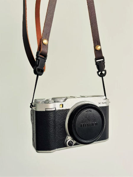 Slim cowhide dark brown camera strap with fuji camera