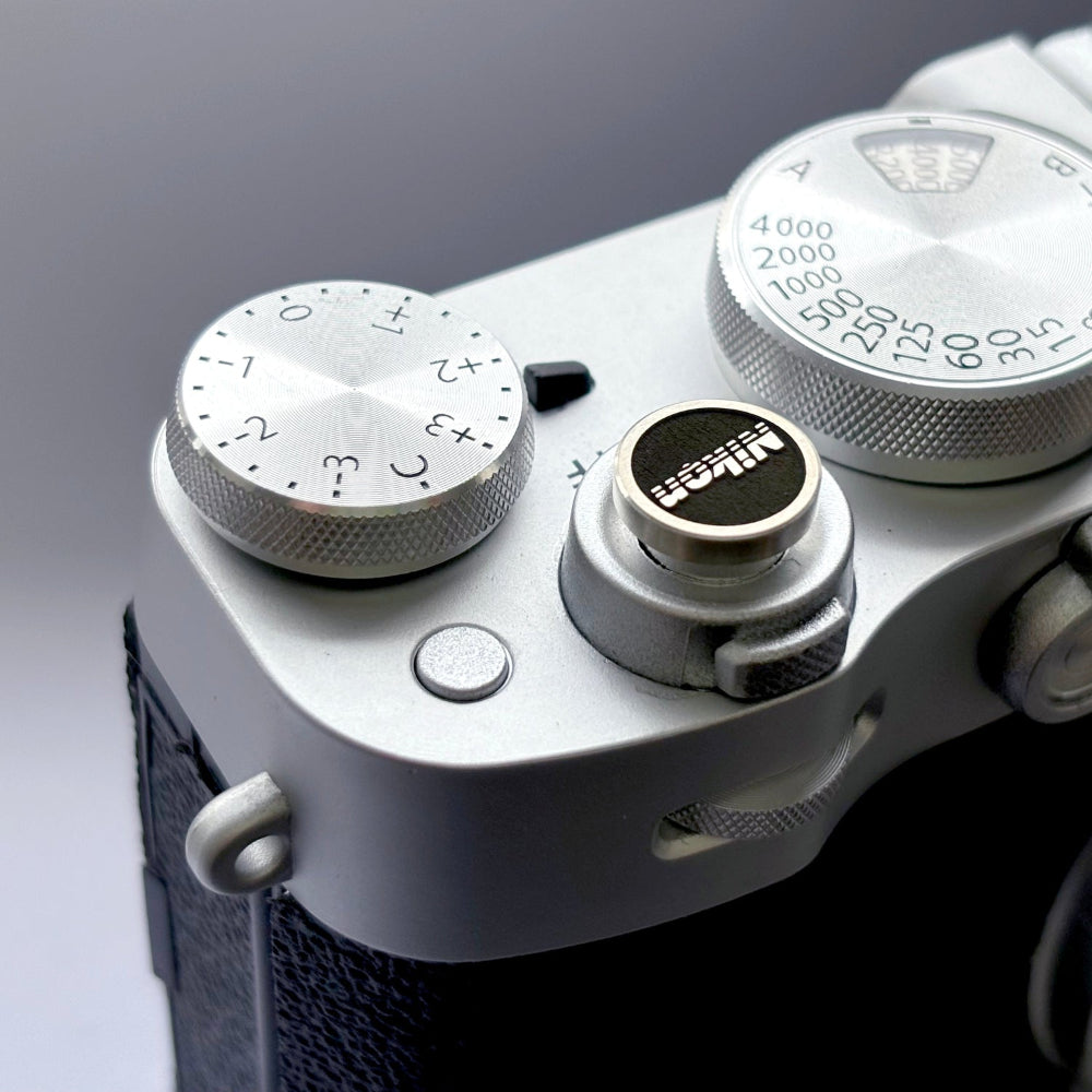 Premium silver camera shutter button on Nikon D850