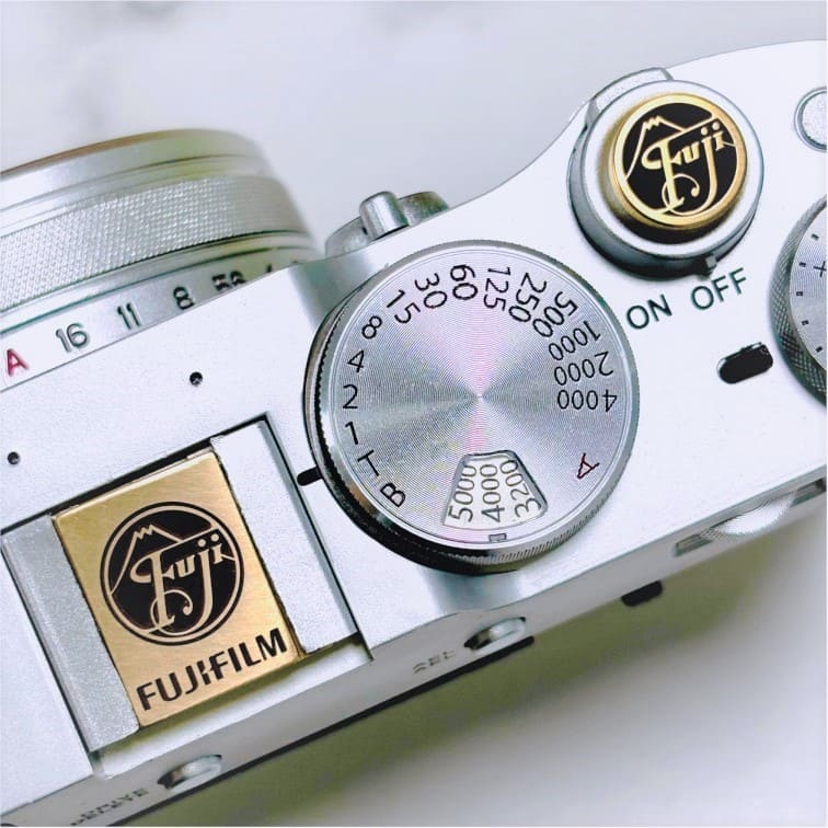 brass circular fujifilm hot shoe protector and shutter button