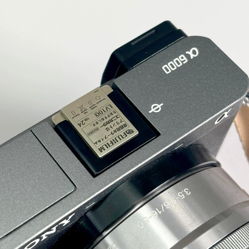 Silver hot shoe cap for Fuji X-series