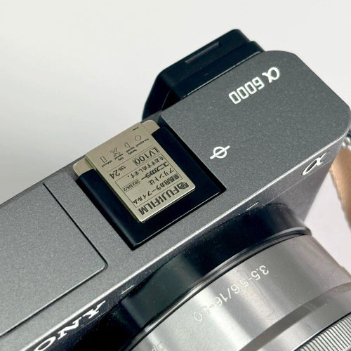 Silver hot shoe cap for Fuji X-series