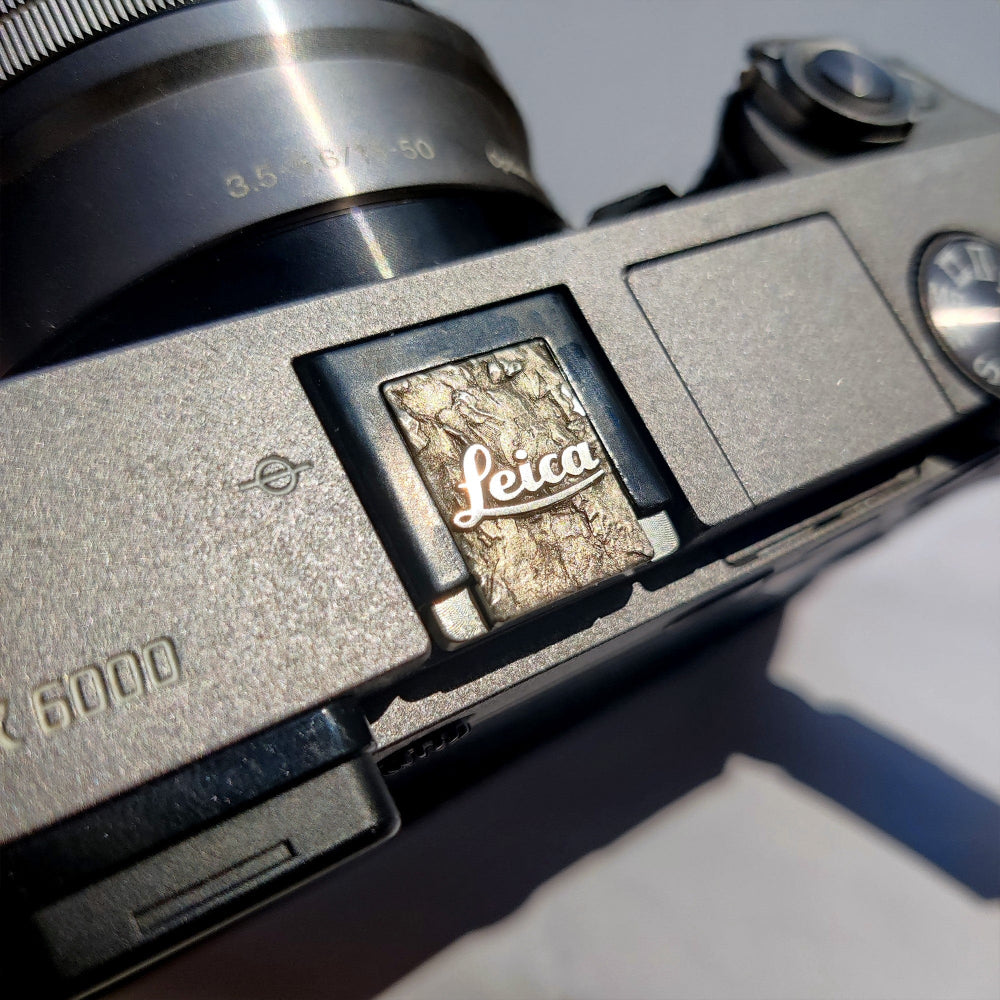 brass hot shoe accessory for Leica in modern silver finish