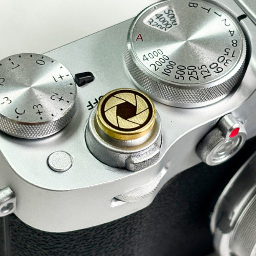 Close-up of Lens Master camera shutter button details