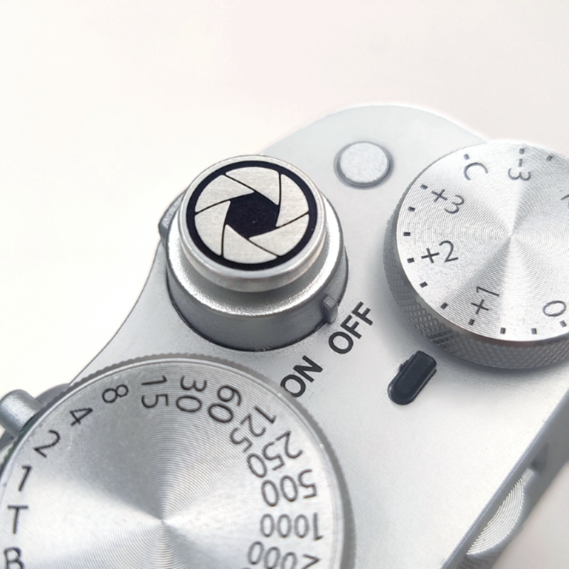 Lens Master silver shutter button on Fujifilm camera