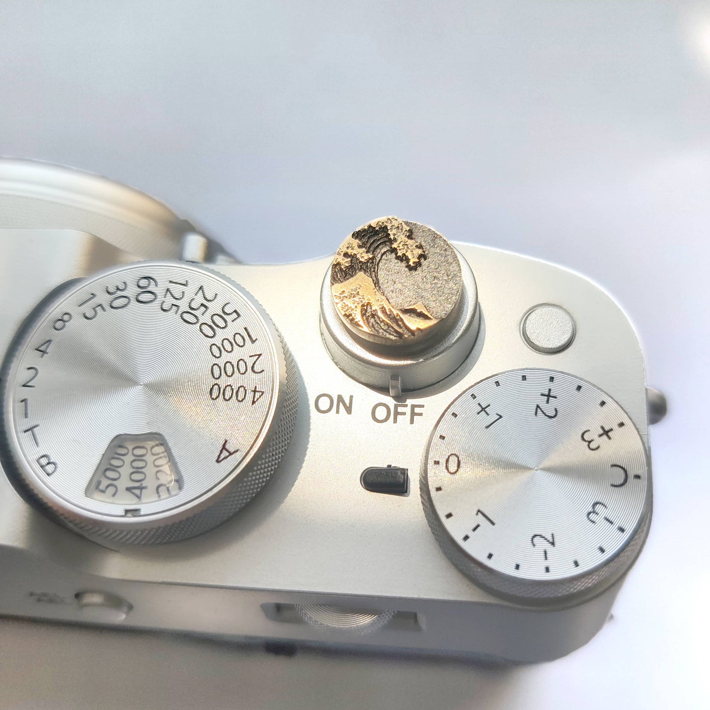 engraved sea wave gold shutter release button