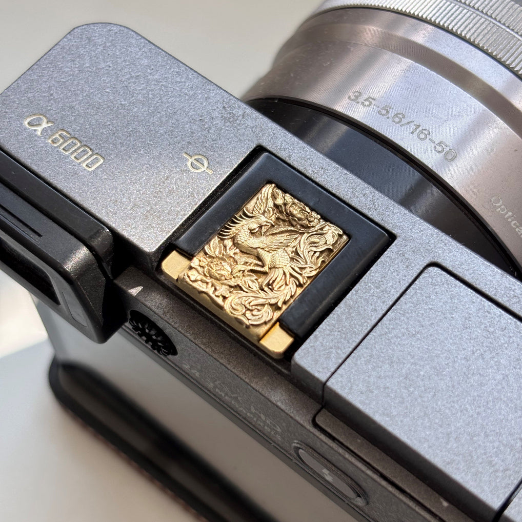 Phoenix Luxury Design Brass Camera Hot Shoe Cover on Sony a6000