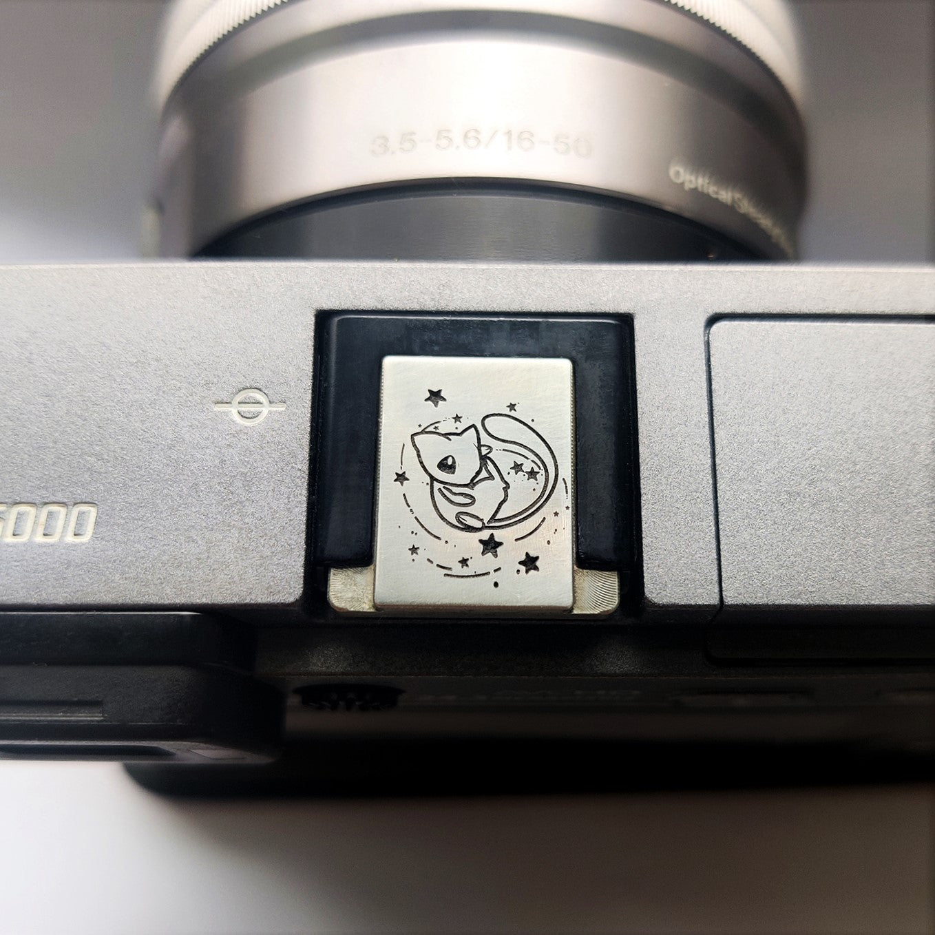silver mew camera hot shoe cover