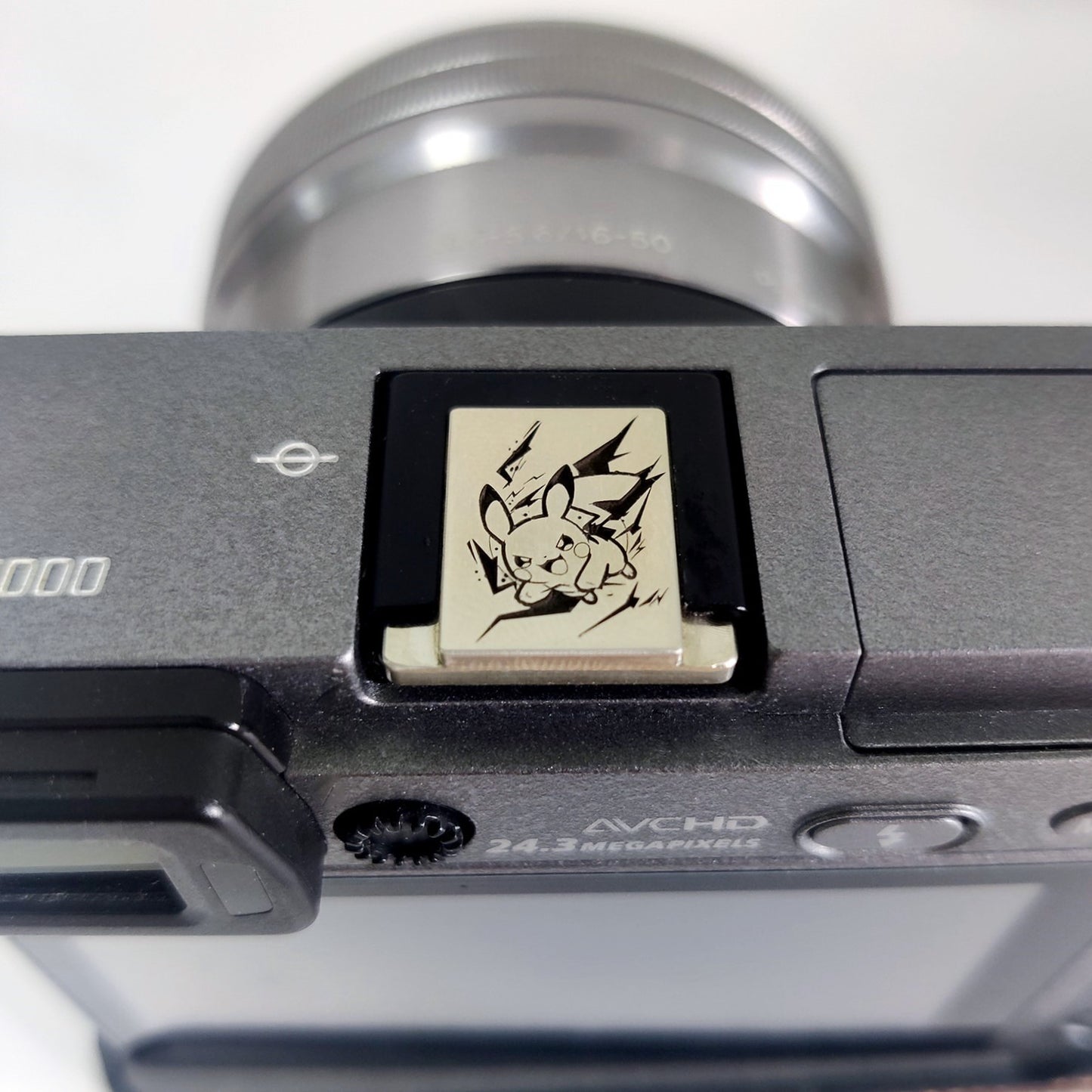 engraved pikachu camera accessory silver