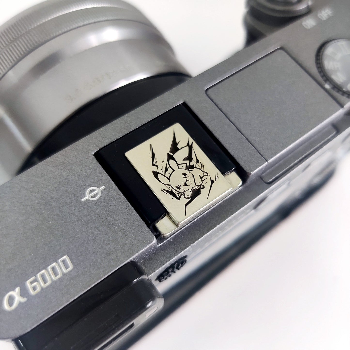 pikachu camera hot shoe cap on sony camera