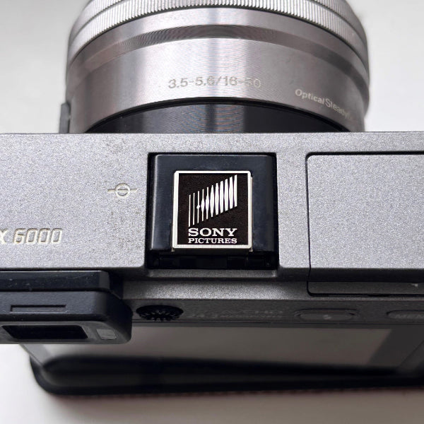 Sony camera with a durable brass hot shoe cover