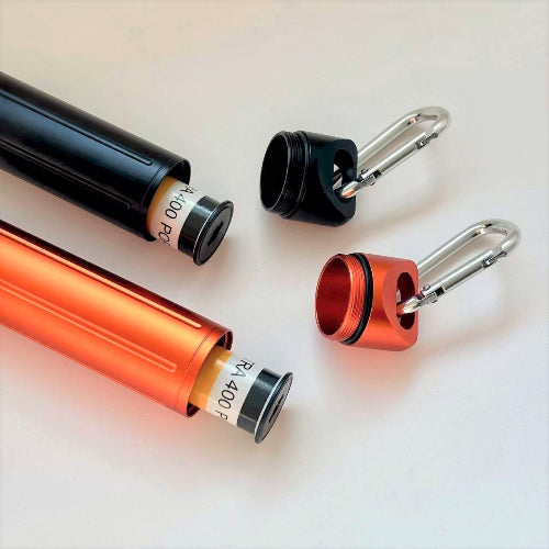 orange and black metal medium format film storage case with carabiner