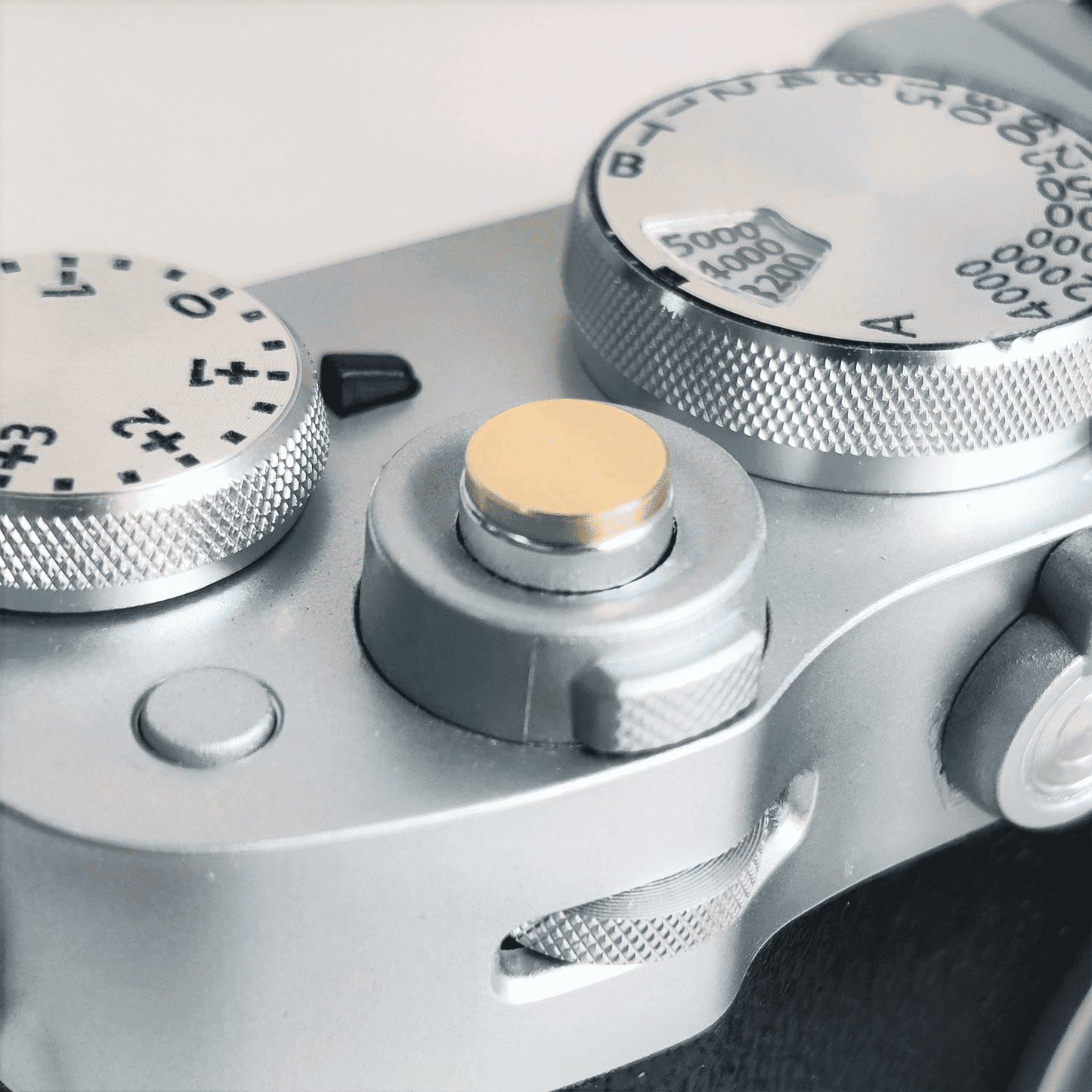 7mm gold shutter button close up