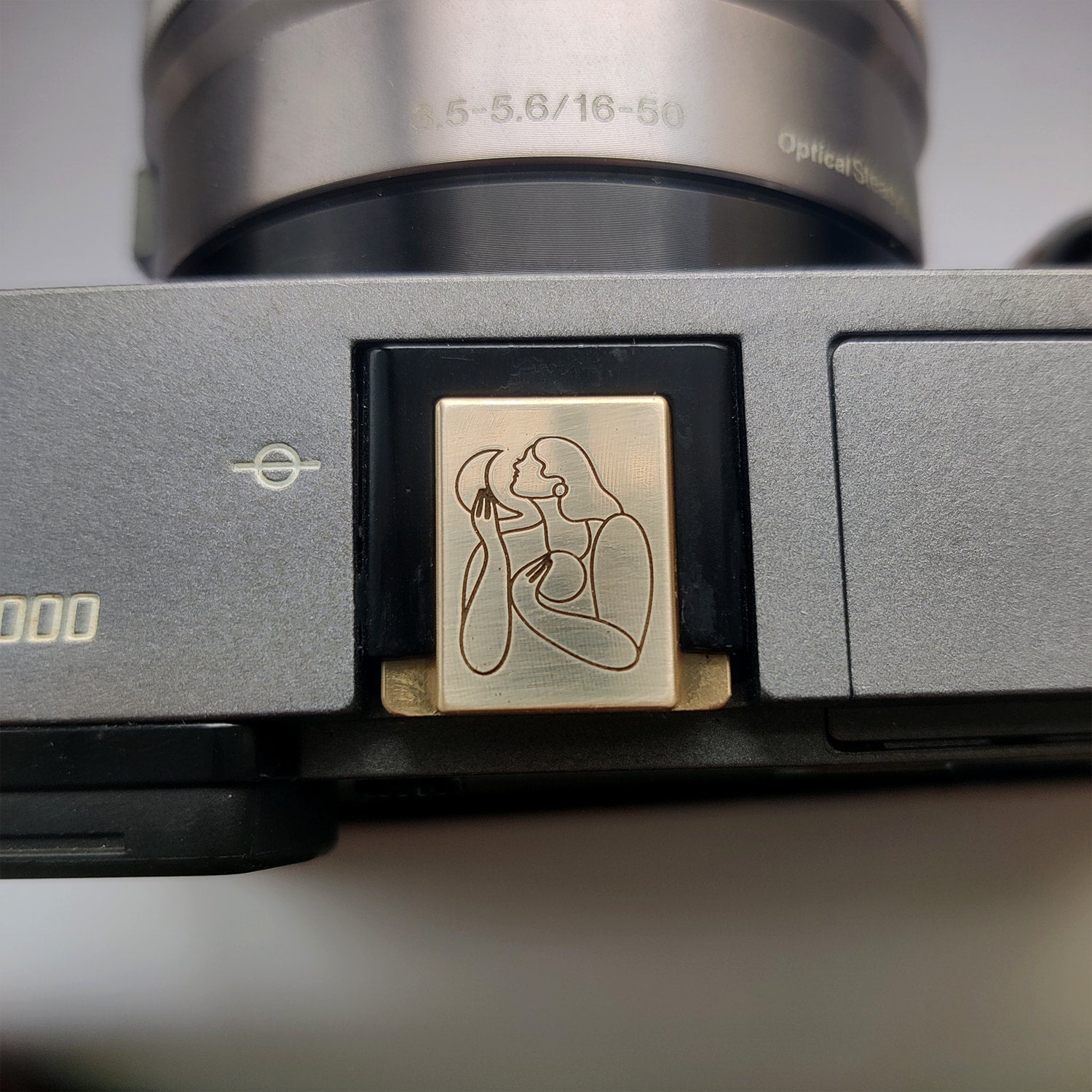 artistic engraved camera hot shoe cover collaboration piece