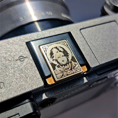 artistic hot shoe protector with Final Fantasy inspired engraving