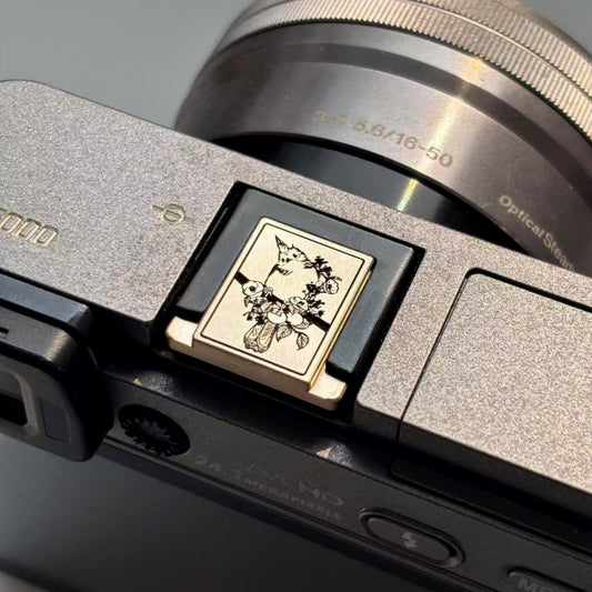 Close-up flower bird camera hot shoe cover