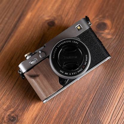 walnut camera grip for fuji x-e5 camera on surface