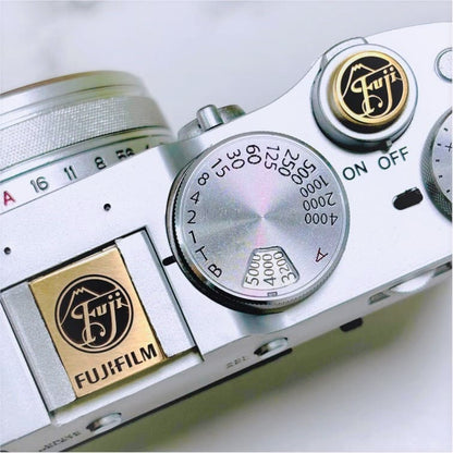 brass circular fujifilm hot shoe protector and shutter button