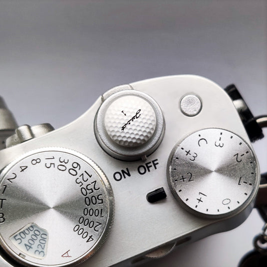 fujifilm golf camera shutter button