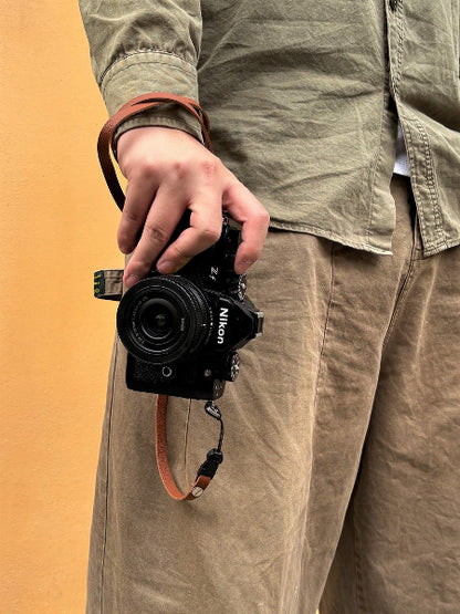 Litchi grain cowhide leather strap with nikon zf camera on hand