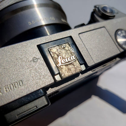 brass hot shoe accessory for Leica in modern silver finish