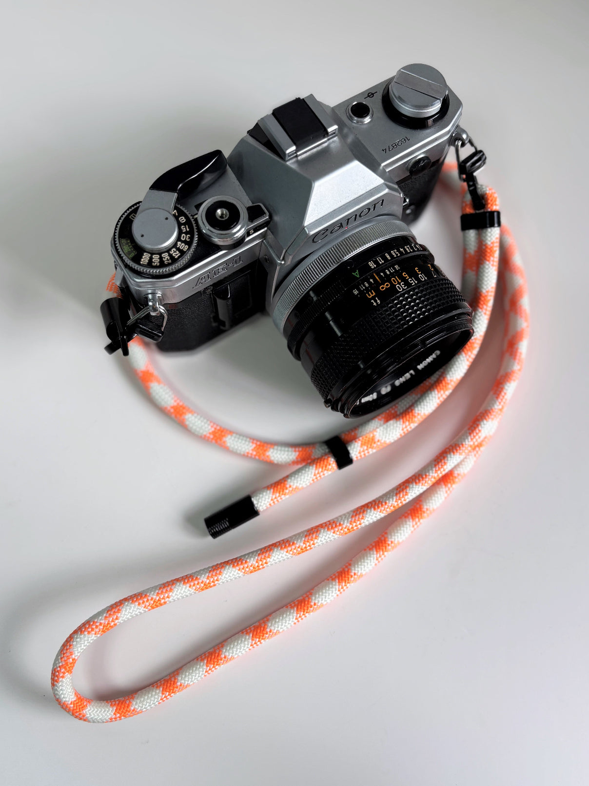 Outdoor camera strap with reflective elements