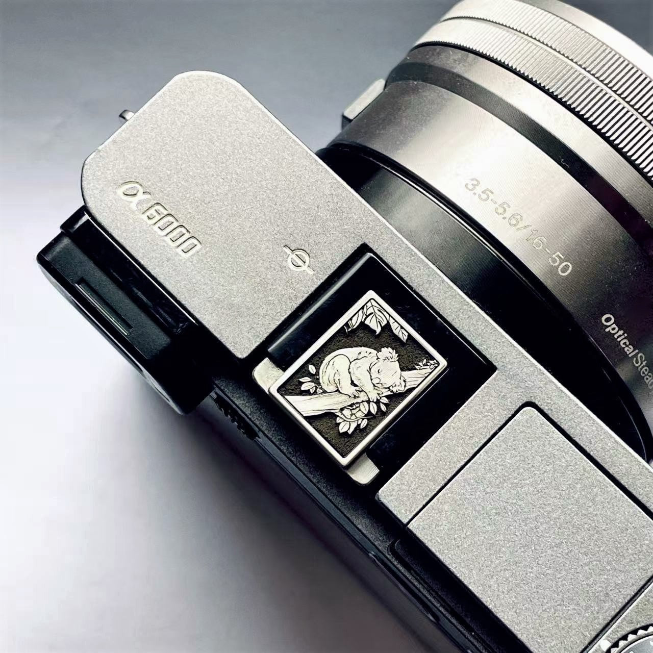 engraved koala design hot shoe cap for mirrorless cameras