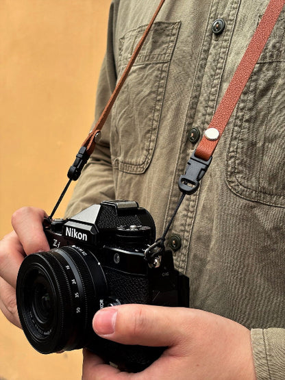 Litchi grain cowhide camera strap on nikon camera