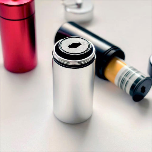 Metallic cylindrical film containers for medium format film rolls