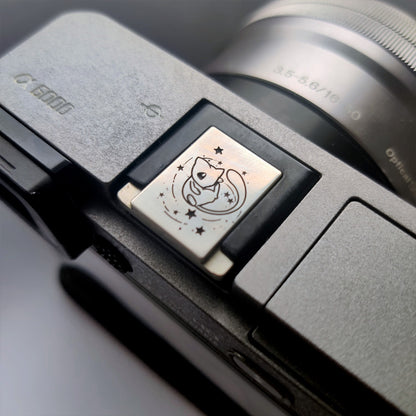 engraved pokemon-style hot shoe accessory