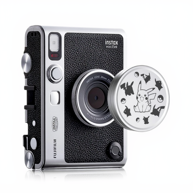 A Fujifilm Instax Mini EVO camera with a lens cap featuring a Pikachu design.