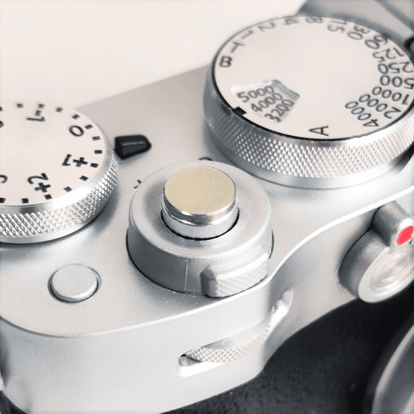 7mm brass shutter button close up