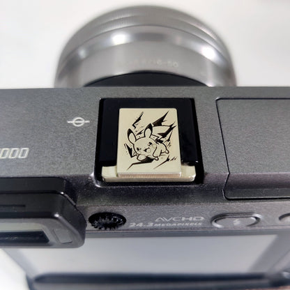 engraved pikachu camera accessory silver